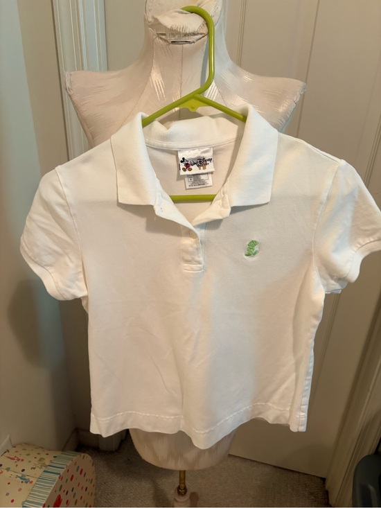 Disney Other - Disney women’s White Polo Shirt with Green Crest - size Small